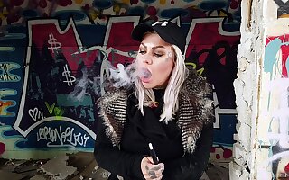 Blonde Lady Smokes An Electric Cigarette On Inappropriate to